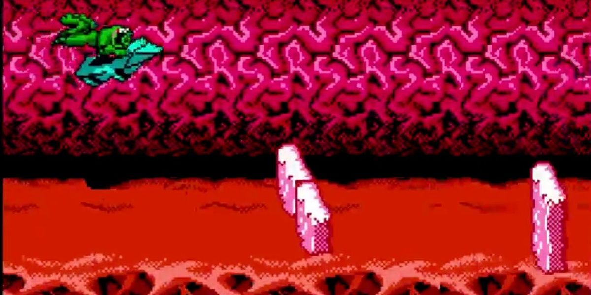 Um Battletoad se prepara para a ponte no nível Turbo Tunnel do NES Battletoads