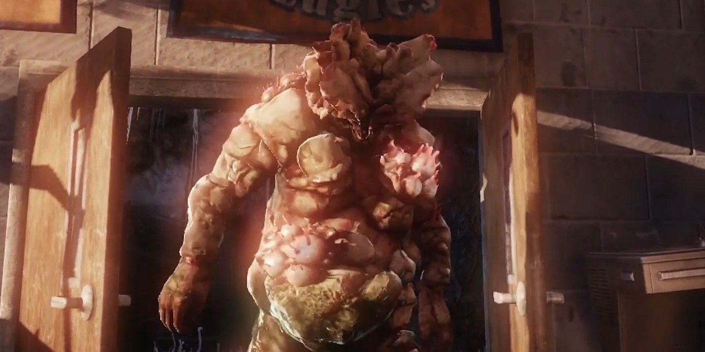 Um Bloater explode através de um par de portas no videogame The Last of Us