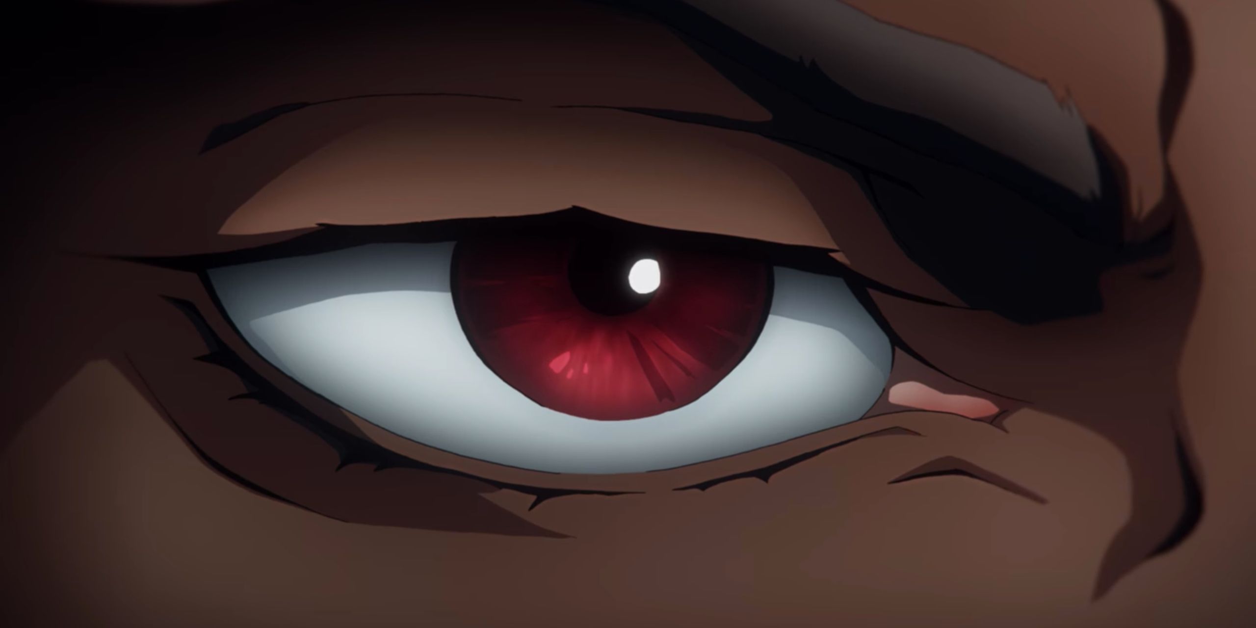A close-up shot of Isaac's eye, which is colored red.