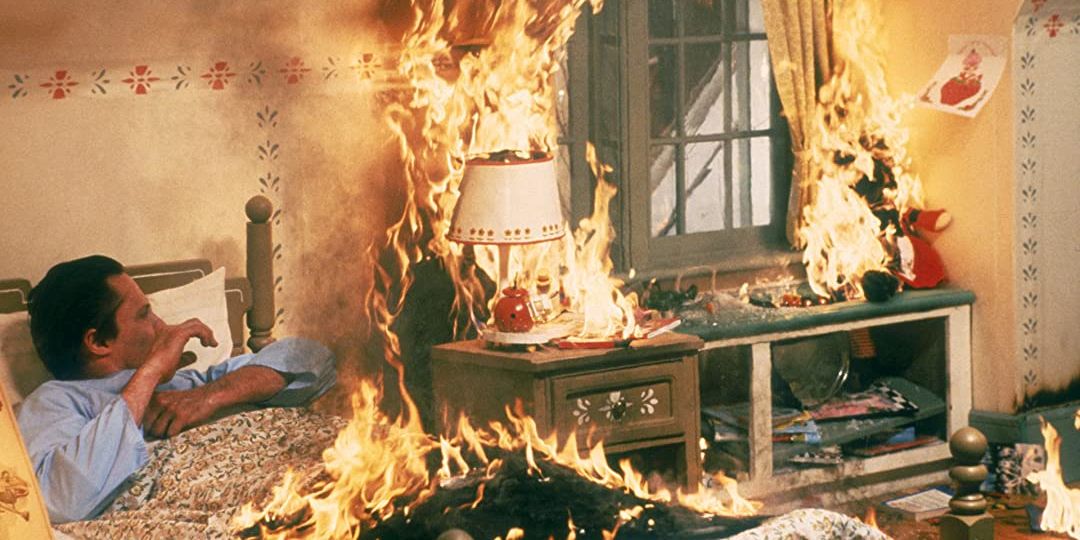 Christopher Walken awakens to find his room engulfed in flames in Dead Zone