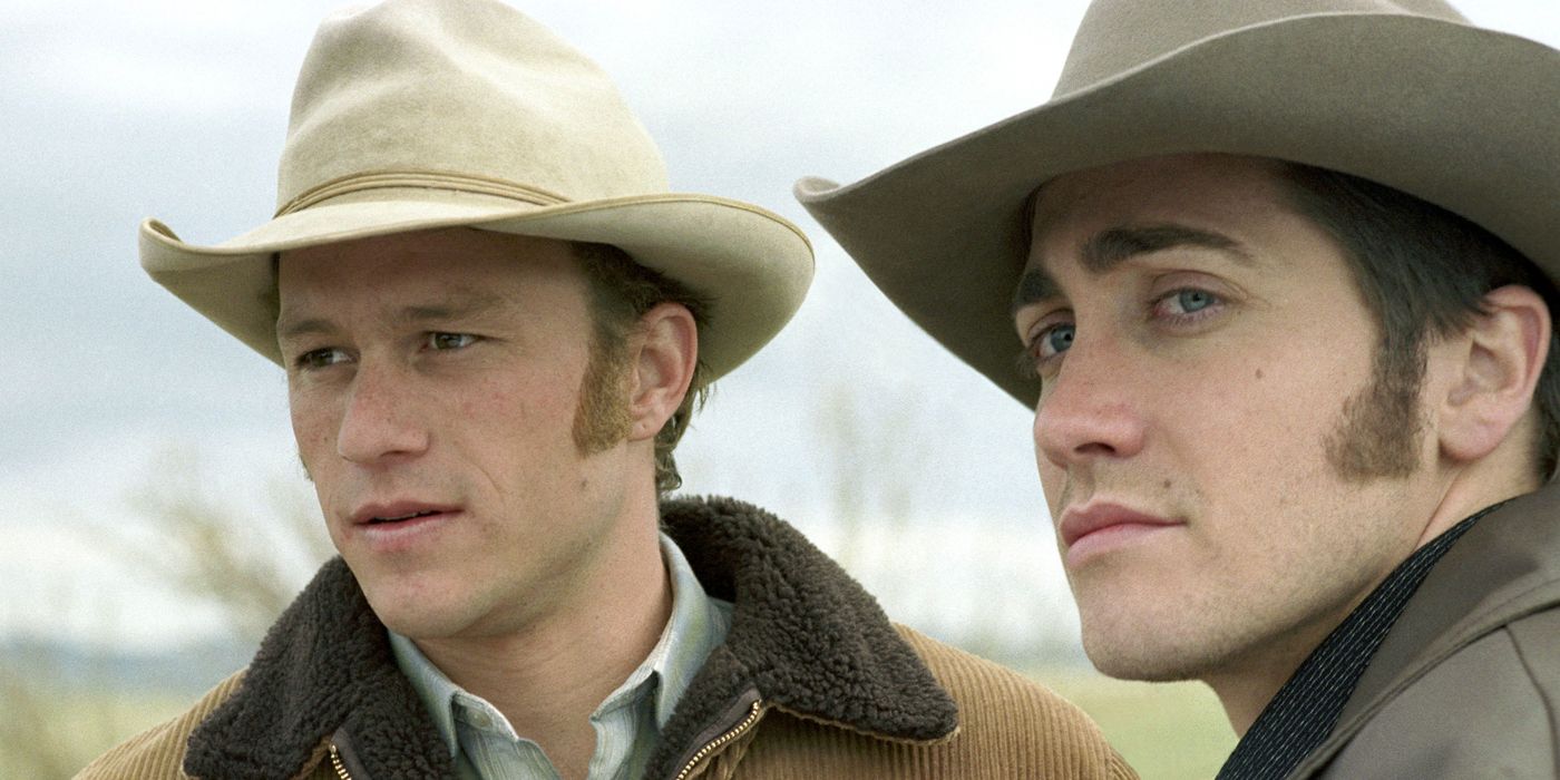 Jake Gyllenhaal and Heath Ledger standing together in Brokeback Mountain.