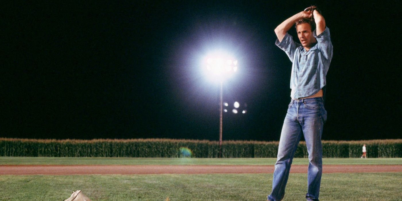 Kevin Costner preparing to throw a baseball in Field of Dreams.