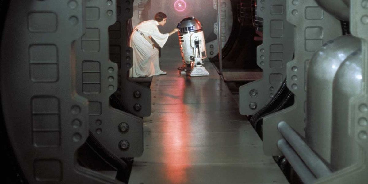 Leia gives the plans to R2D2