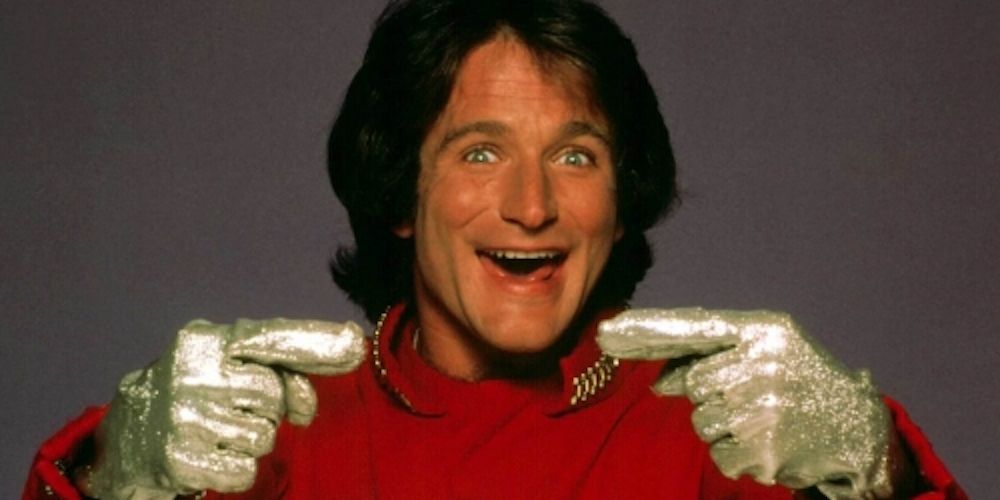 Robin Williams smiling as Mork in Mork & Mindy