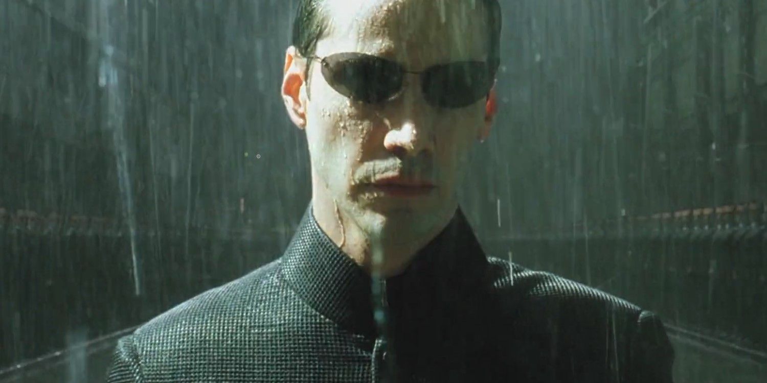 Neo in the rain after entering the matrix for his final fight with smith