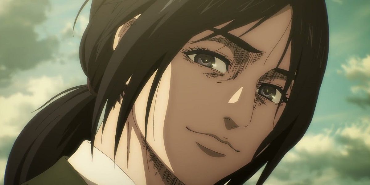 Pieck Finger smiling with her hair pulled back in Attack on Titan.