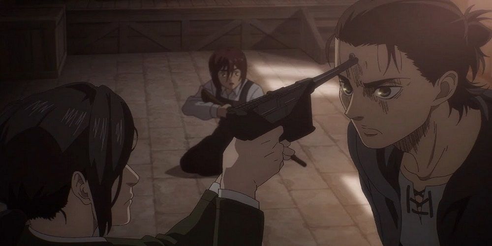 Pieck holds a gun to Eren's head