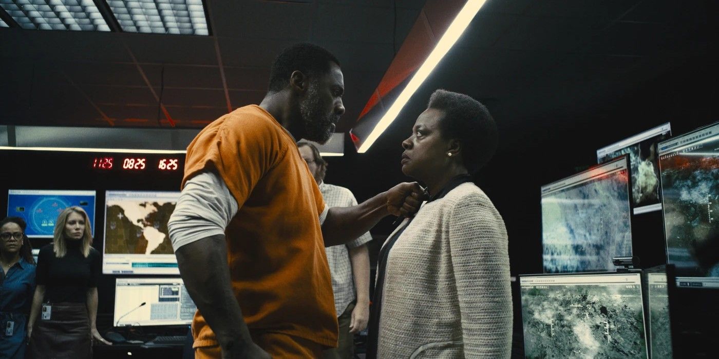 Bloodsport threatens Amanda Waller at knifepoint in The Suicide Squad.