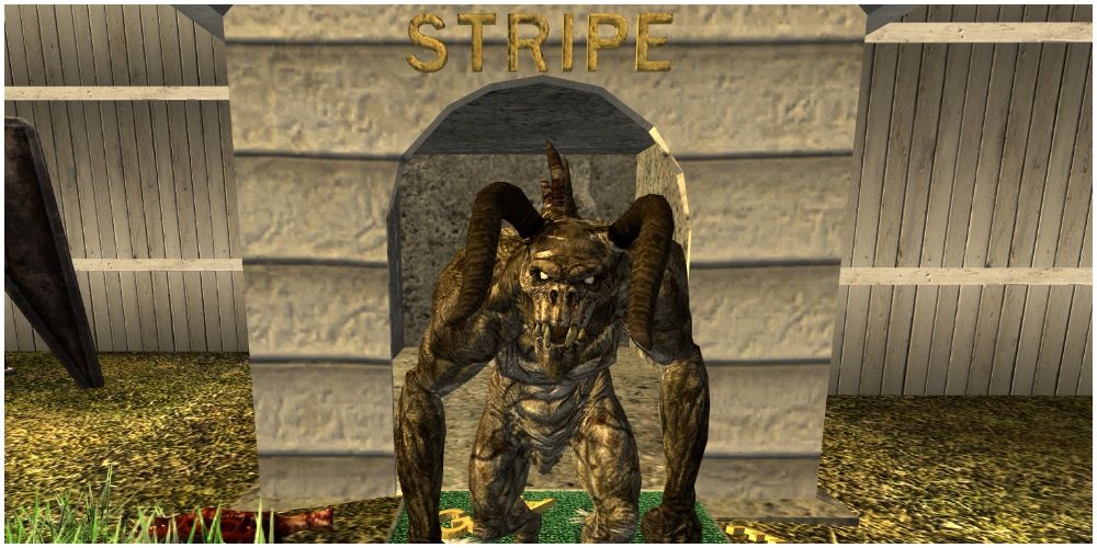 The deathclaw named Stripe in a doghouse in fallout new vegas