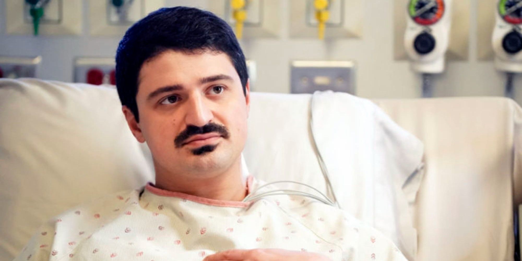 Otis (played by Yuri Sardarov) lays in a hospital bed on Chicago Fire