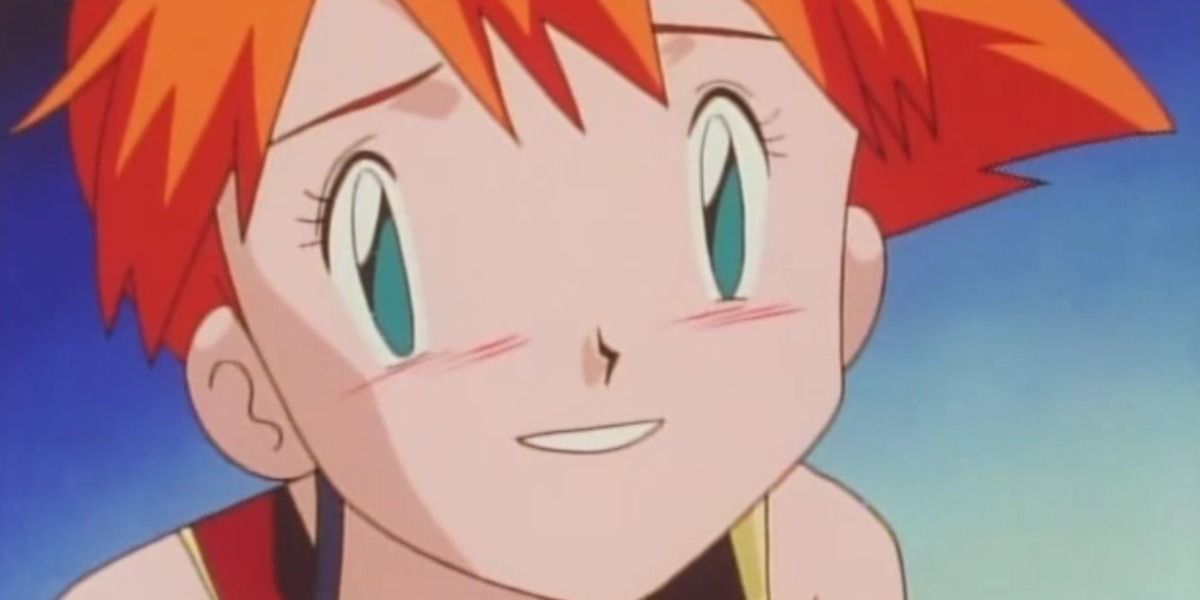 Misty looks up happily as she realizes Ash is alive