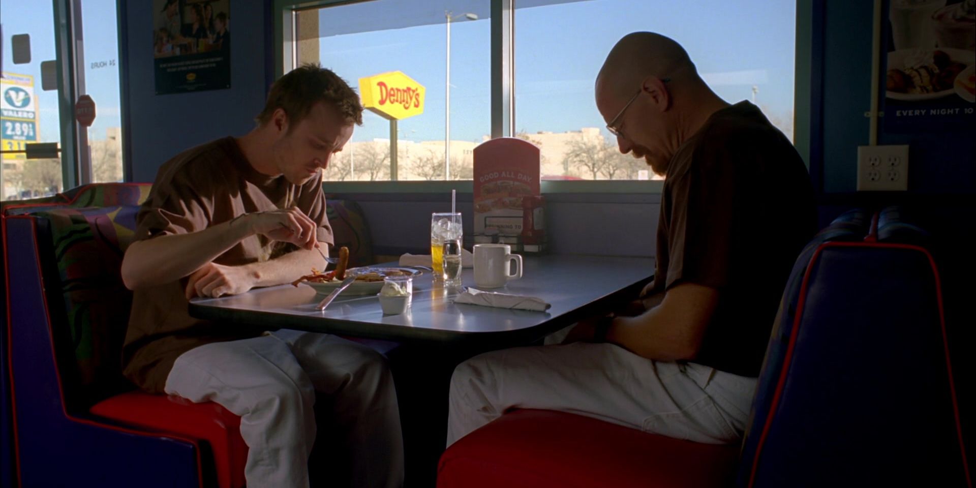 Jesse Pinkman and Walter White eating breakfast in Breaking Bad.