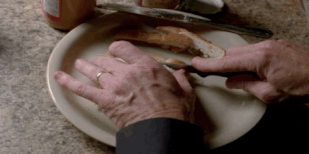 Water White cutting the crusts off of his sandwiches in Breaking Bad.