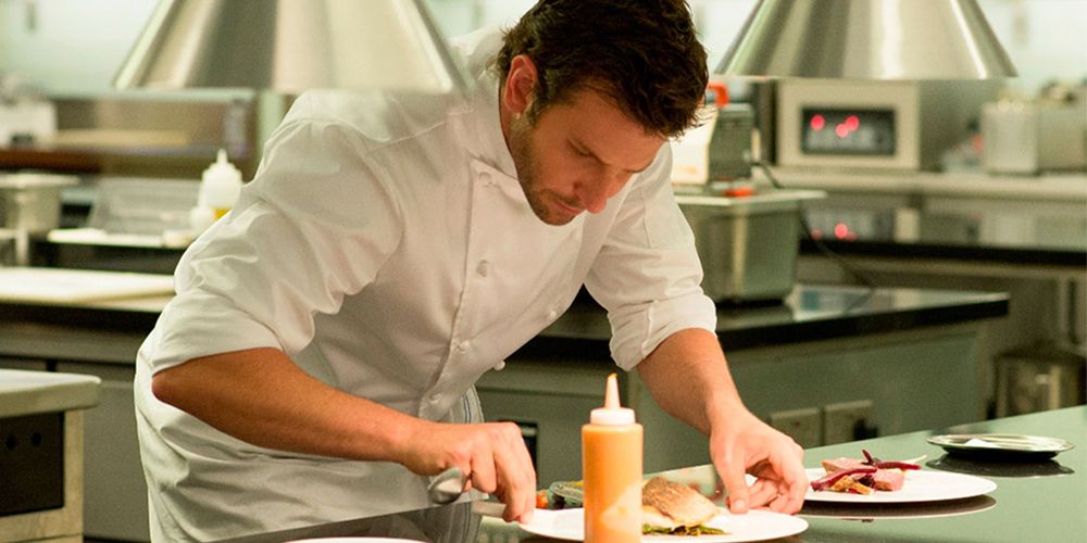 Bradley Cooper cooking in a super clean kitchen