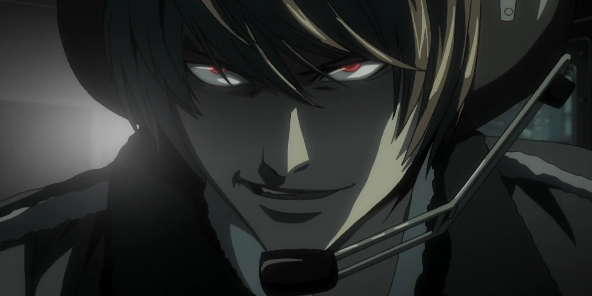 Light Yagami wearing a headset in a helicopter while regaining his memory in Death Note.