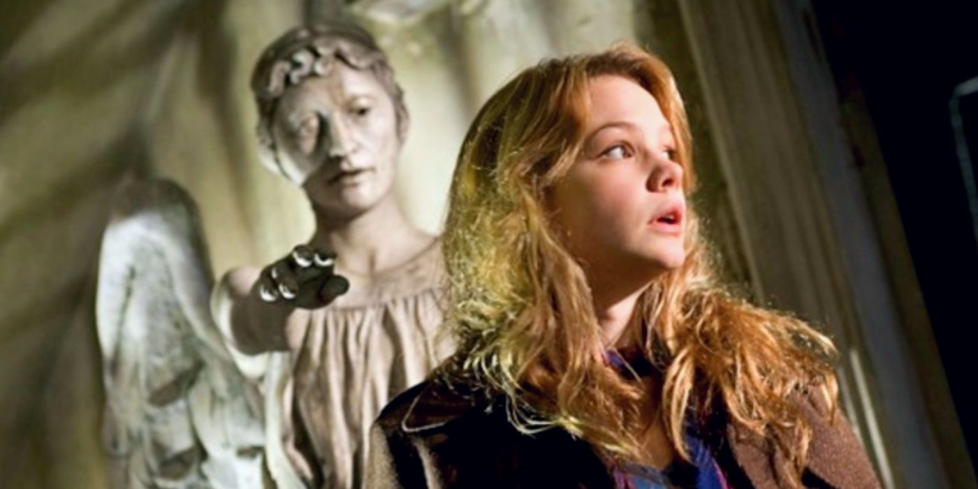 A Weeping Angel lurks behind Sally Sparrow in Doctor Who Season 3 Blink