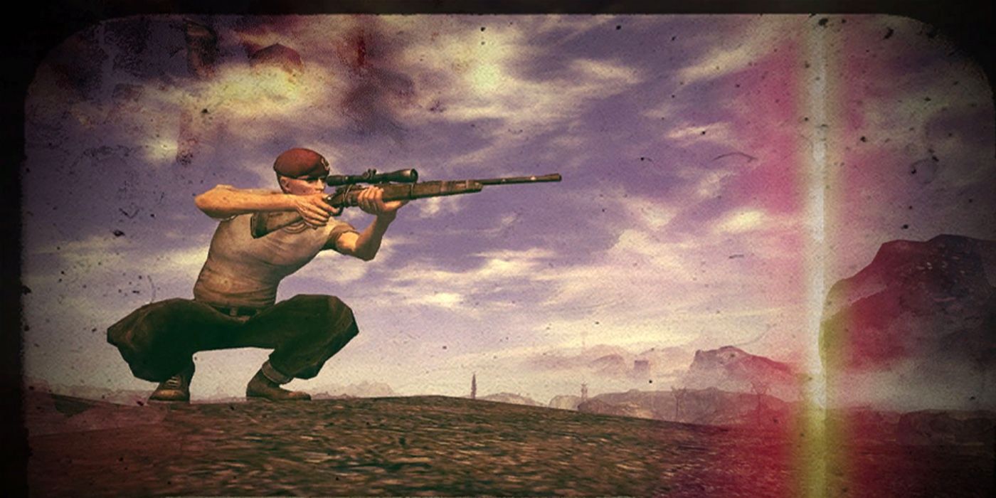 Craig Boone aims a rifle in the middle of a wasteland