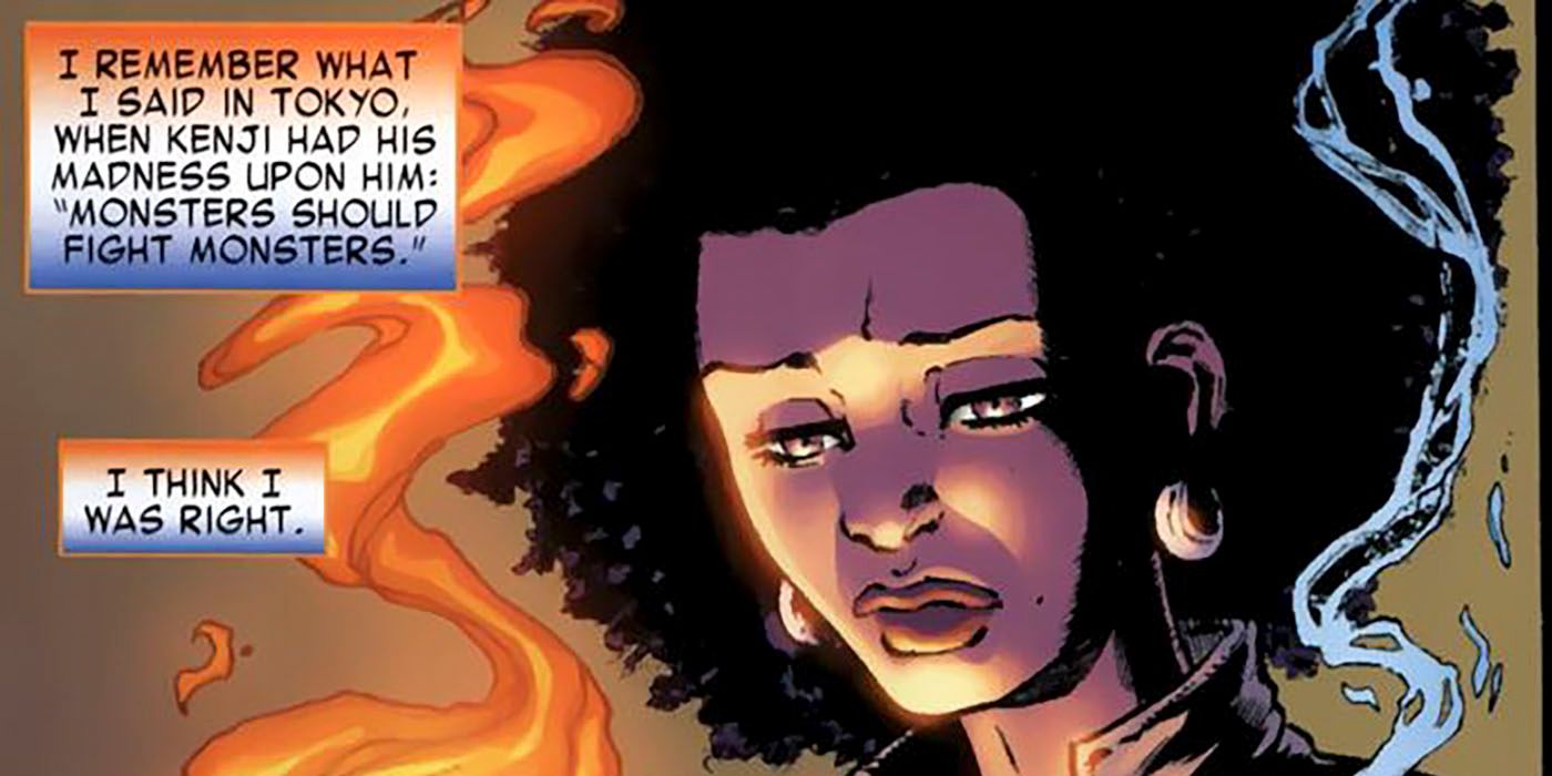 A woman with an afro stares down at her hands (off panel) with flames and ice coming off them.