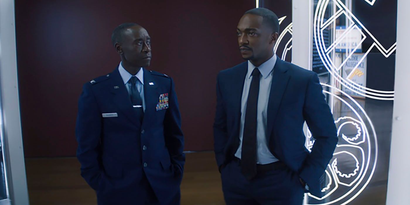 James Rhodes wears his uniform and Sam Wilson wears a suit in the Captain America exhibit in the Smithsonian.
