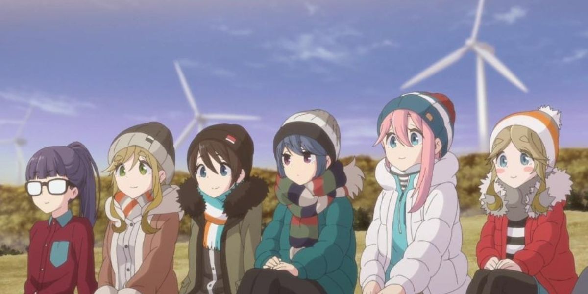 Rin Shima sitting with the members of the Outdoor Activities Club