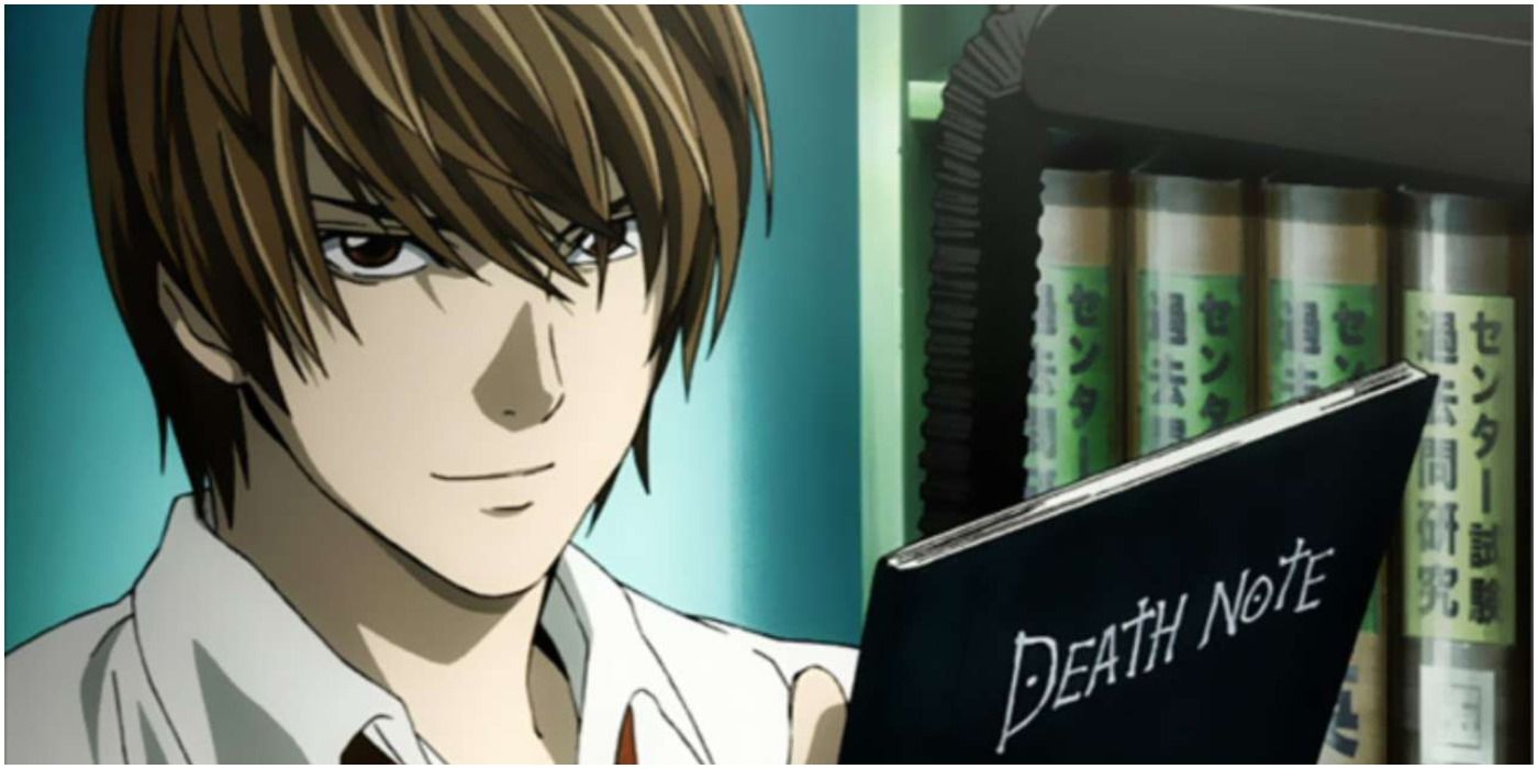 Light smiles and holds Death note