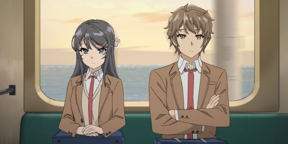 Mai and Sakuta sitting in a train from Rascal Does Not Dream of Bunny Senpai