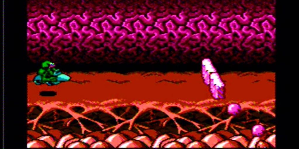 A Battletoad braces for the bridge in the Turbo Tunnel level of NES Battletoads