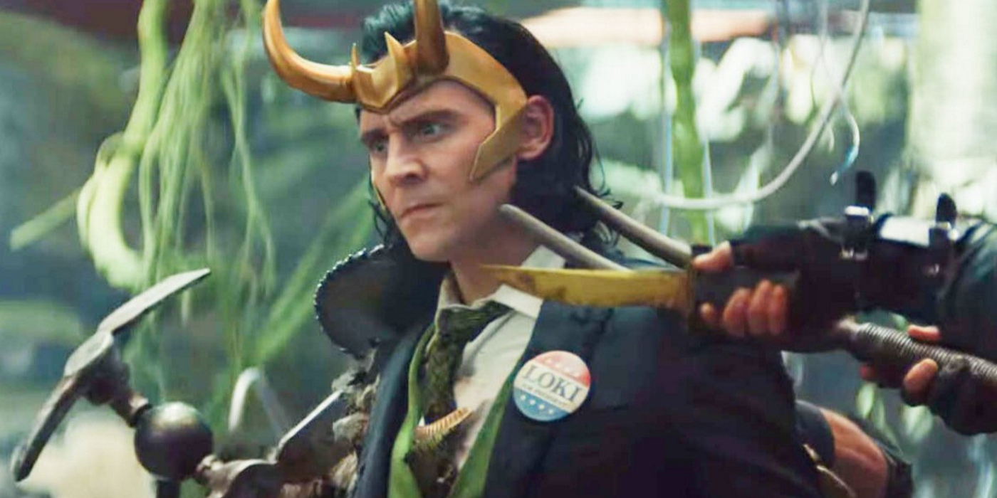 President Loki With Knives Held To His Throat