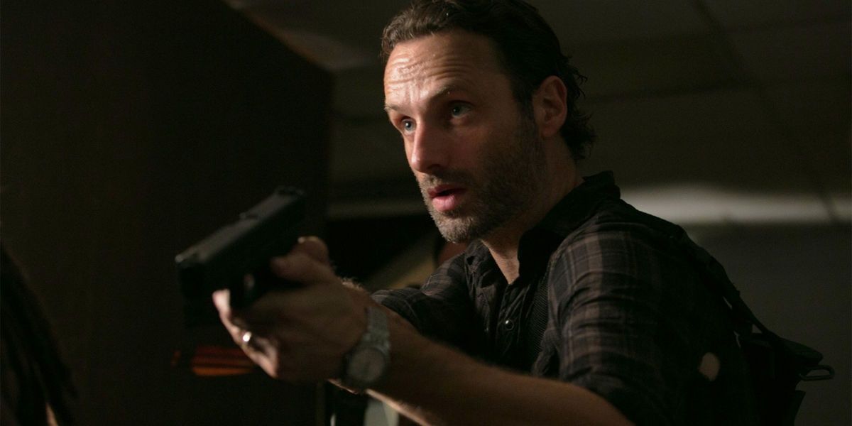 Rick Grimes holding a pistol in TWD