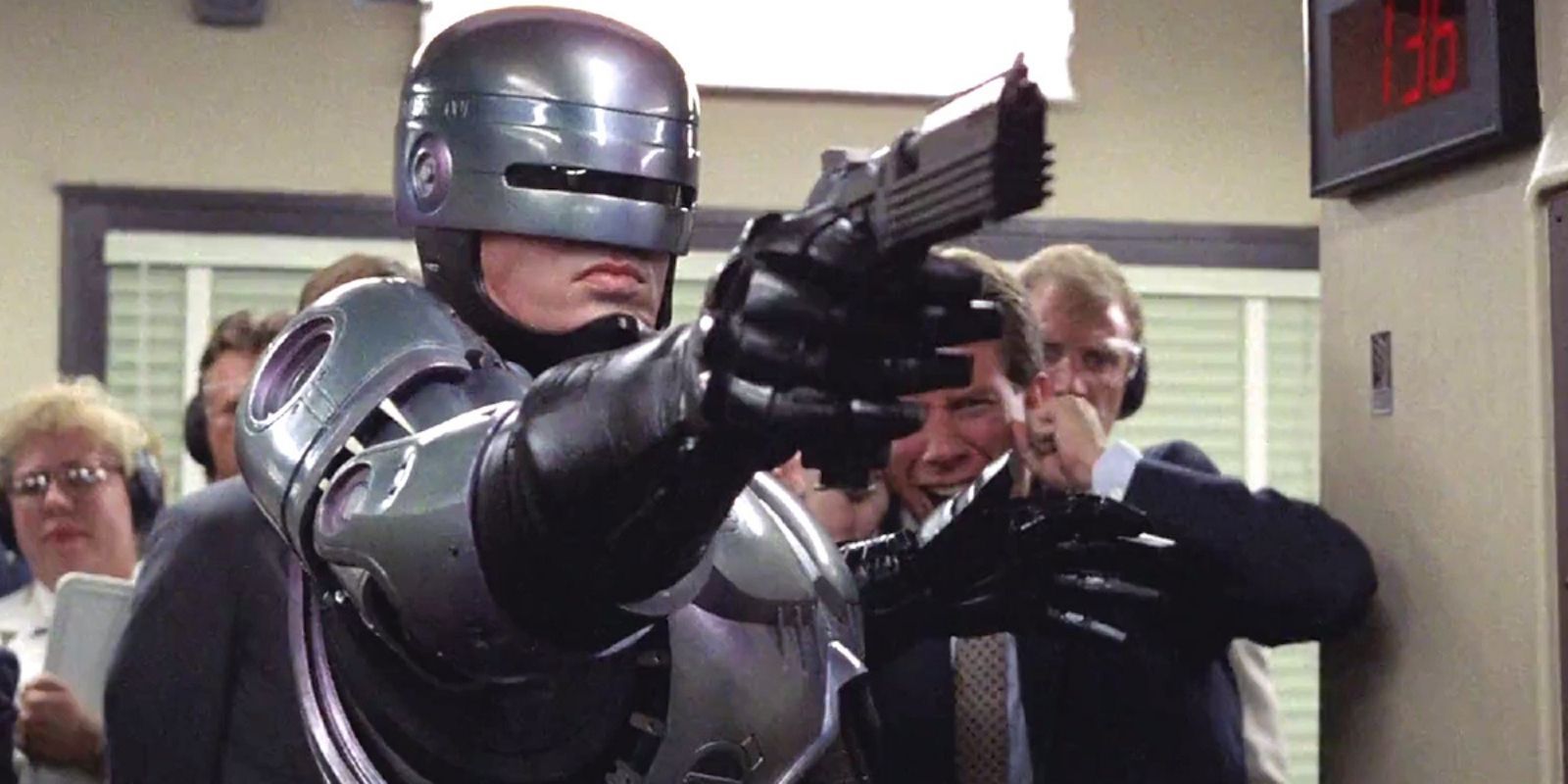 RoboCop firing his weapon