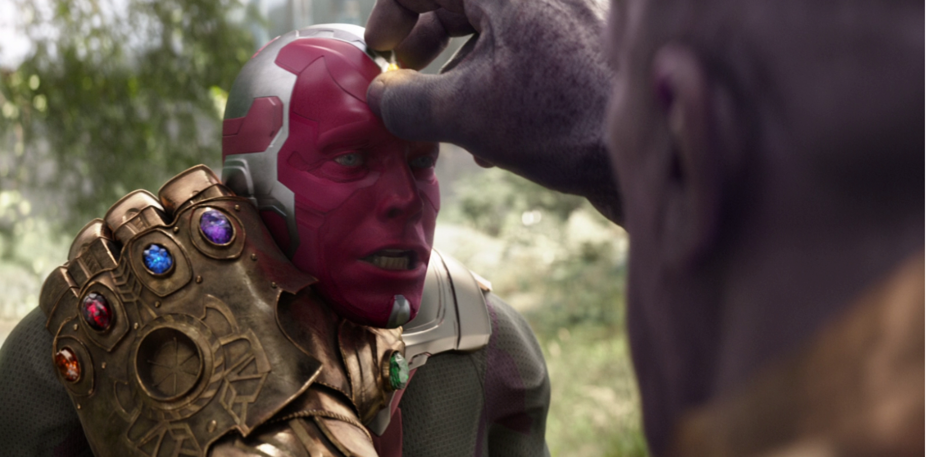 Thanos ripping the Mind Stone from Vision in Infinity War