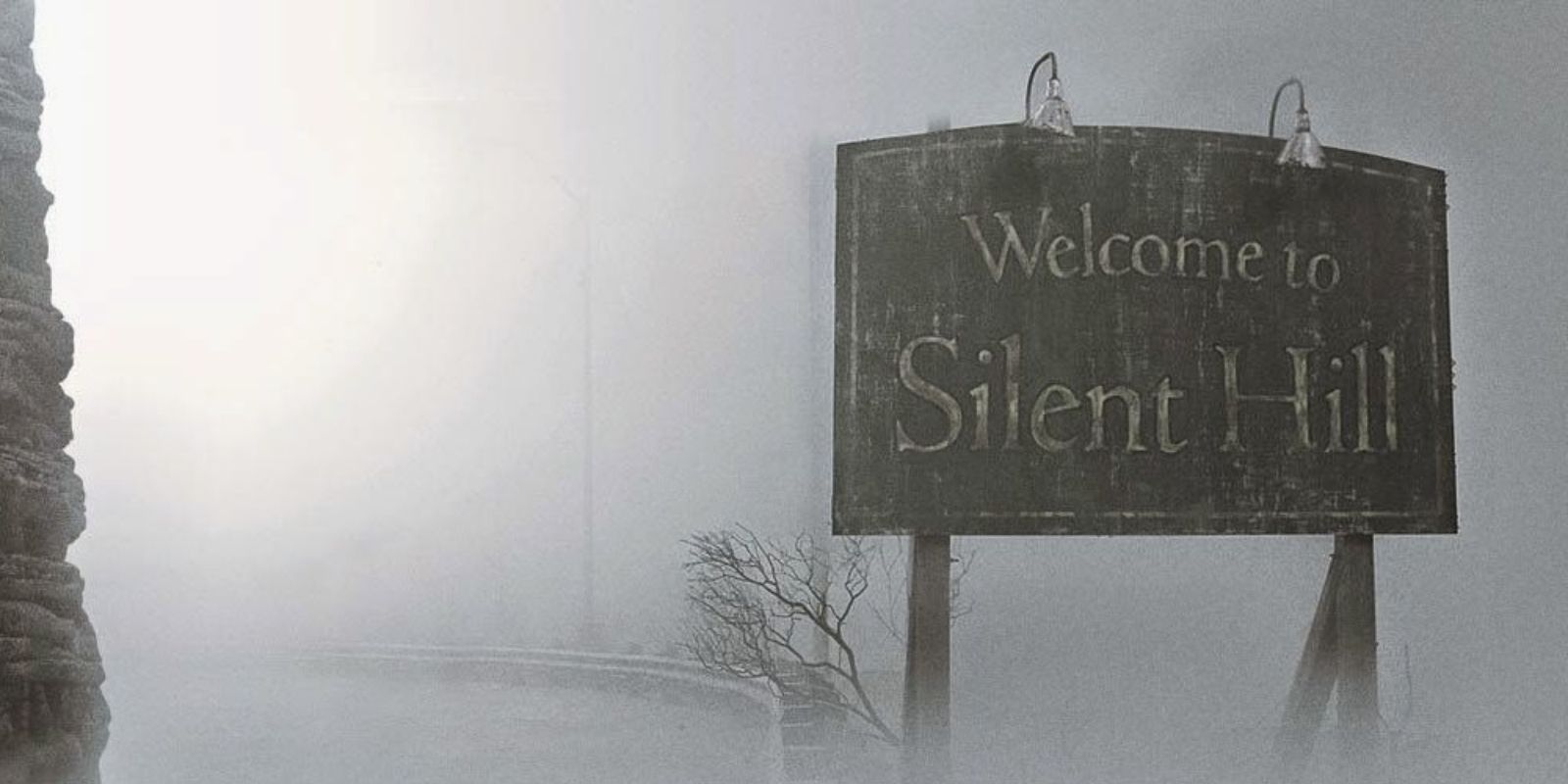 Foggy signpost that reads &quot;Welcome to Silent Hill&quot;