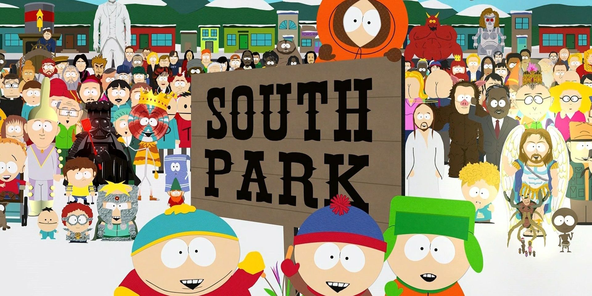 South Park cast standing around the South Park sign