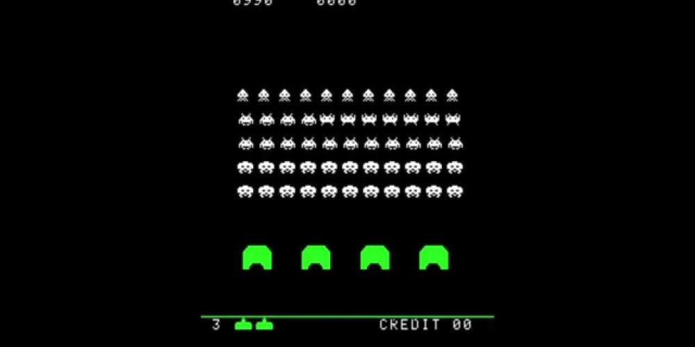 The aliens begin to invade in Space Invaders gameplay.