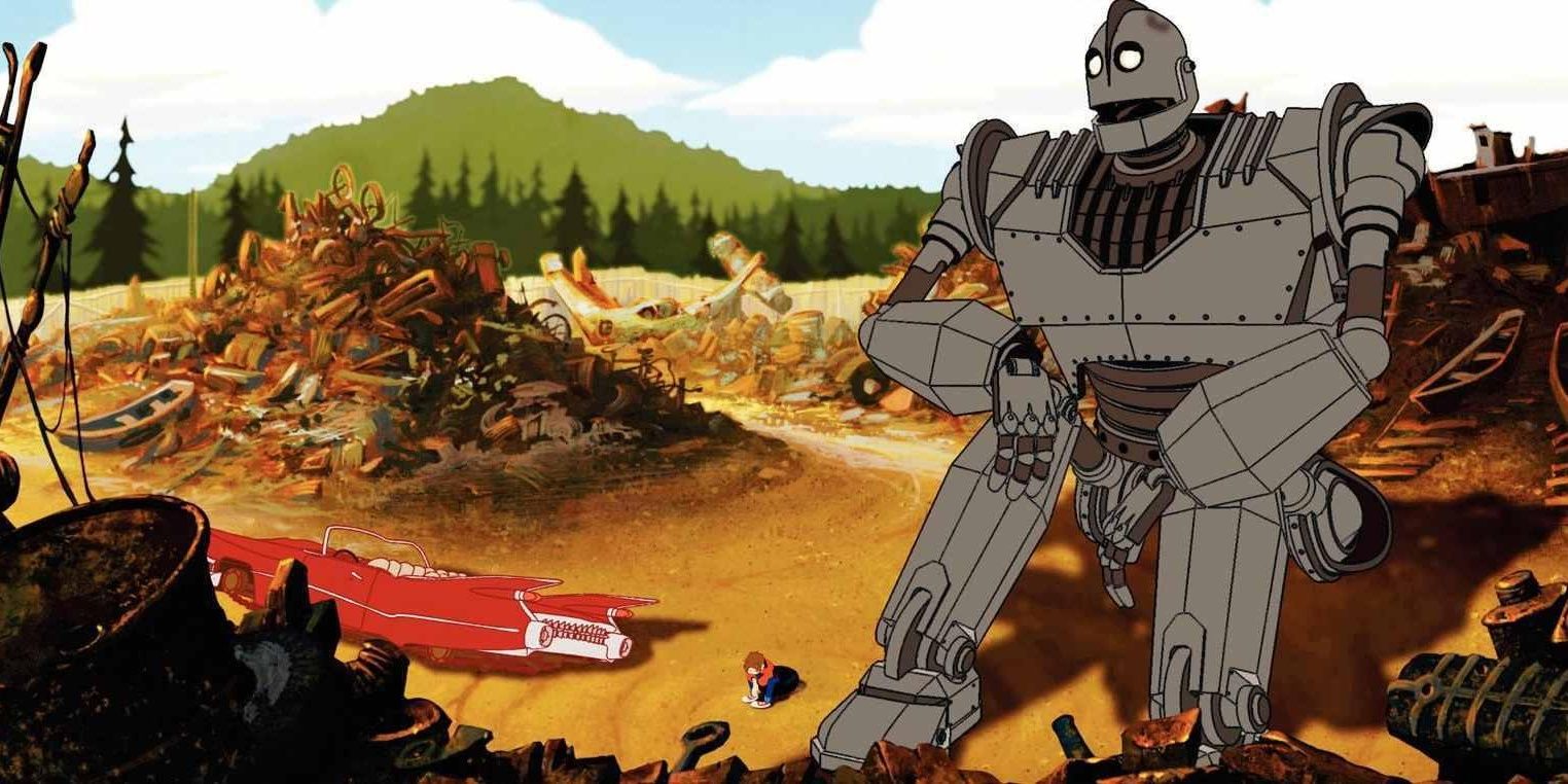 Hogarth and The Iron Giant sitting in a junkyard