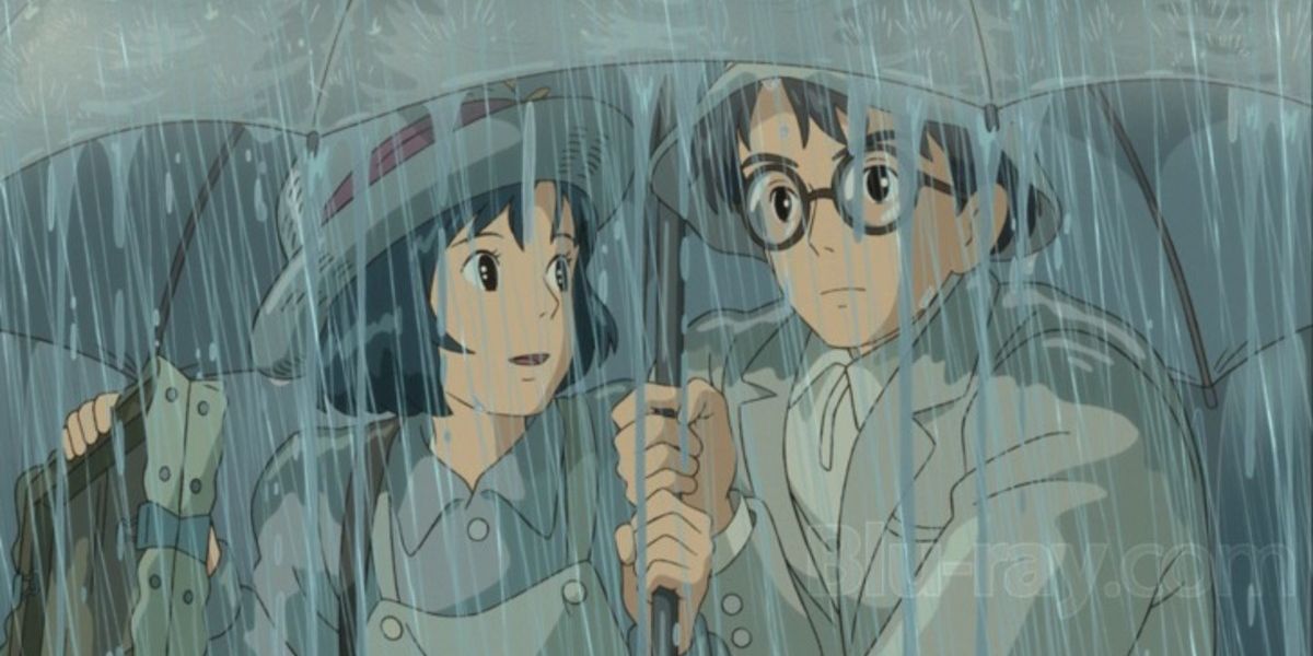 Jiro and Nahoko share an umbrella in the rain in The Wind Rises.