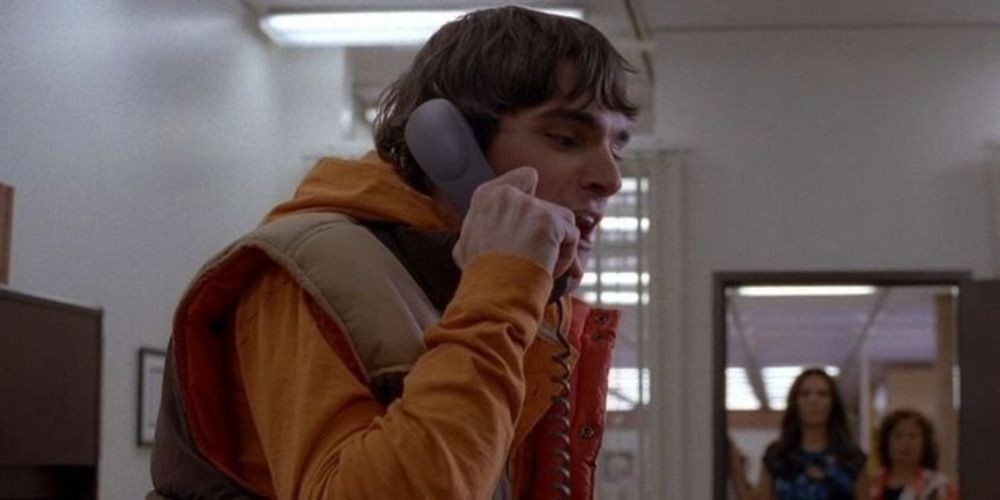 Walt Jr argues with his dad on the phone in Breaking Bad.