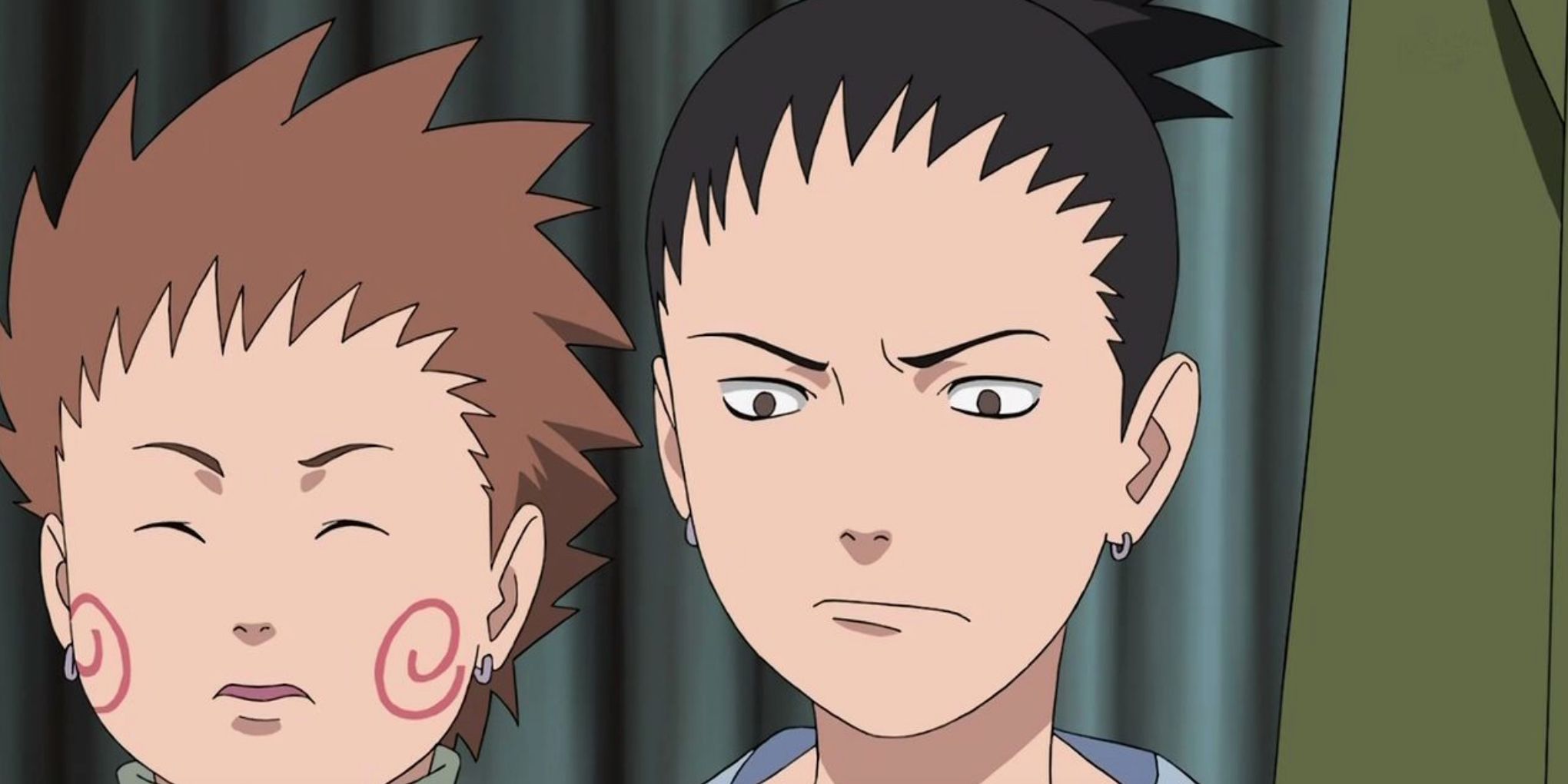 A young Choji and Shikamaru stand together in a Naruto flashback