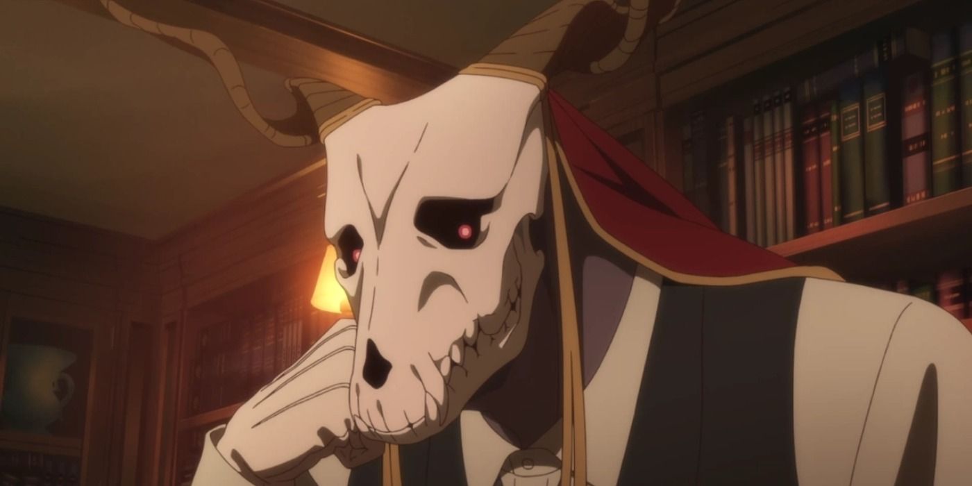 Elias rests his chin on his hand while in his library in The Ancient Magus Bride