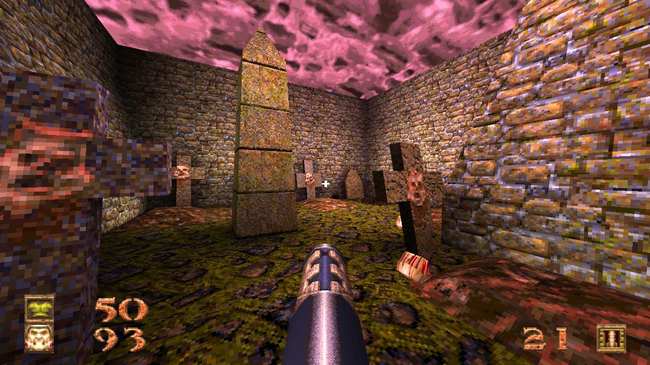 Quake screenshot - the player stands in front of a graveyard