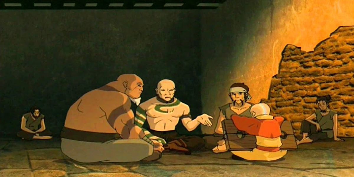 Aang talking with a group of prisoners