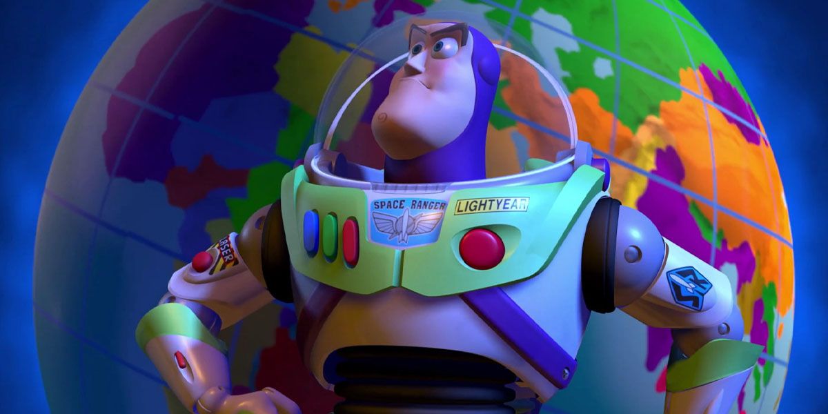 Buzz with his hands on his hips in front of a globe
