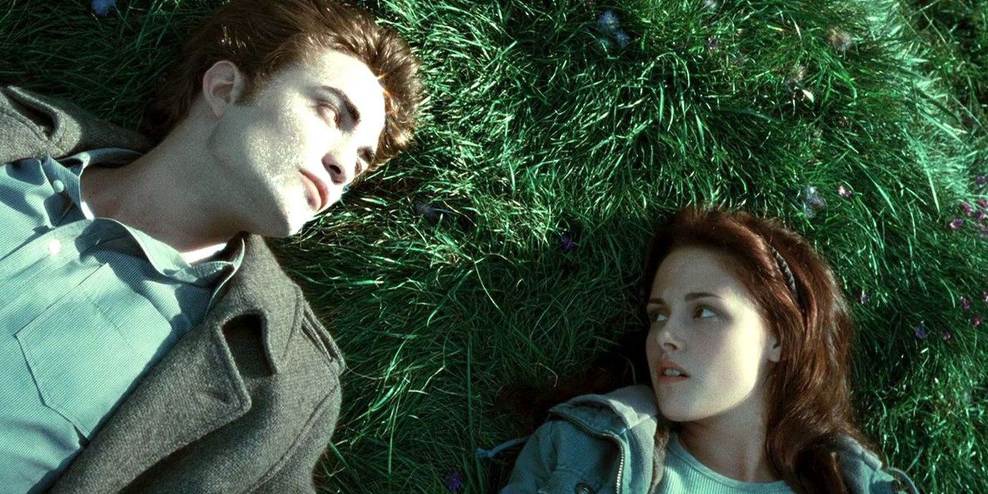 Edward and Bella lying on the grass in Twilight.