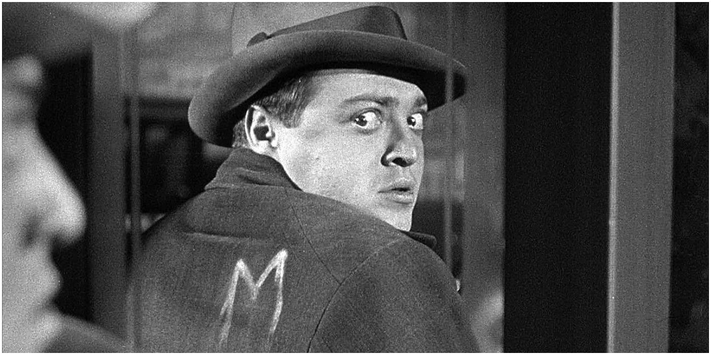 Peter Lorre looks in the mirror and discovers an M on his back