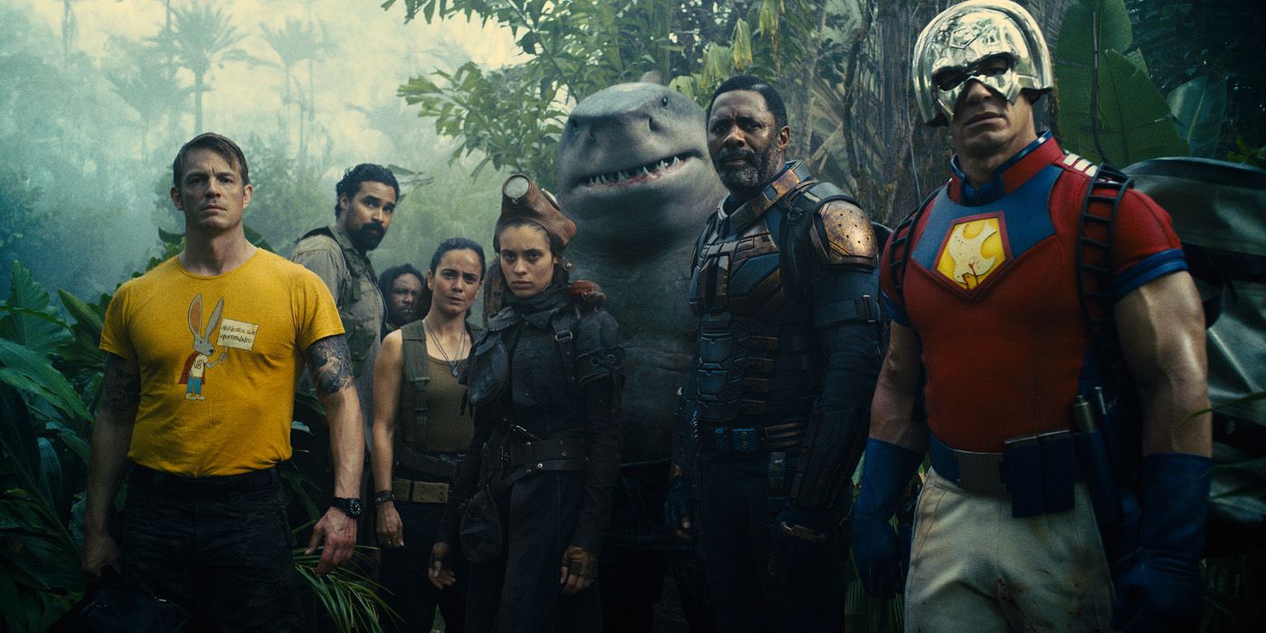 The Suicide Squad standing in the jungle preparing for a mission.