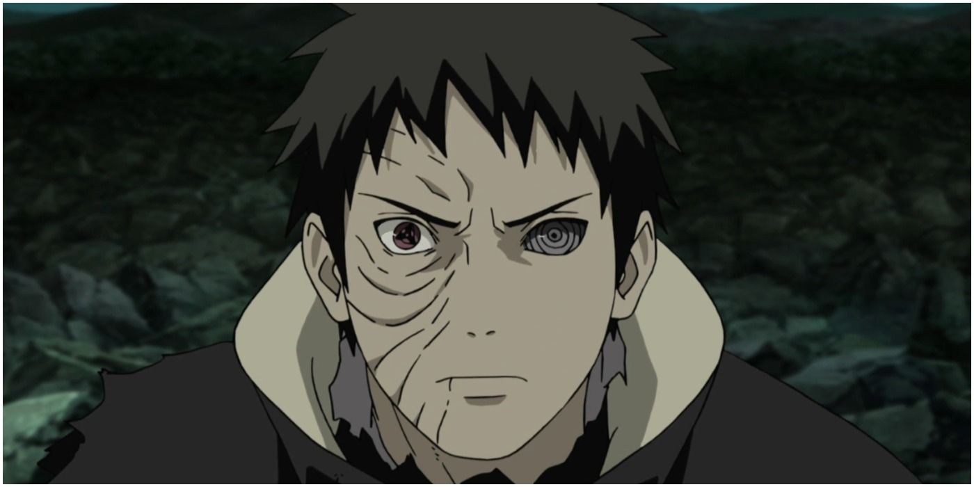 Obito, with both the sharingan and rinnegan, looks concerned