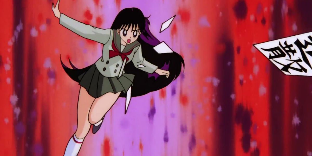 Rei Hino from Sailor Moon throwing paper talismans