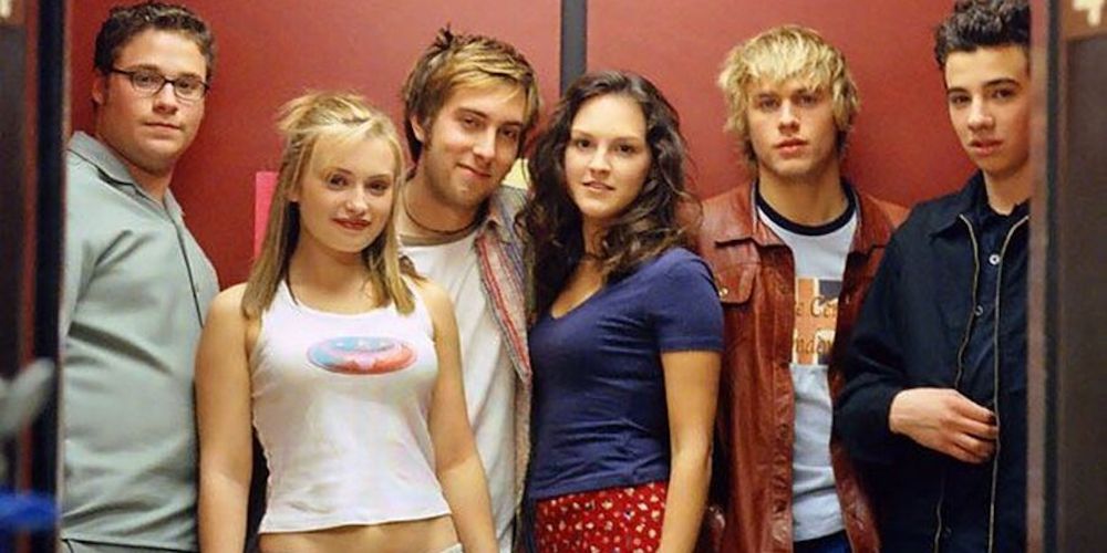 Steve and his friends in an elevator in Undeclared