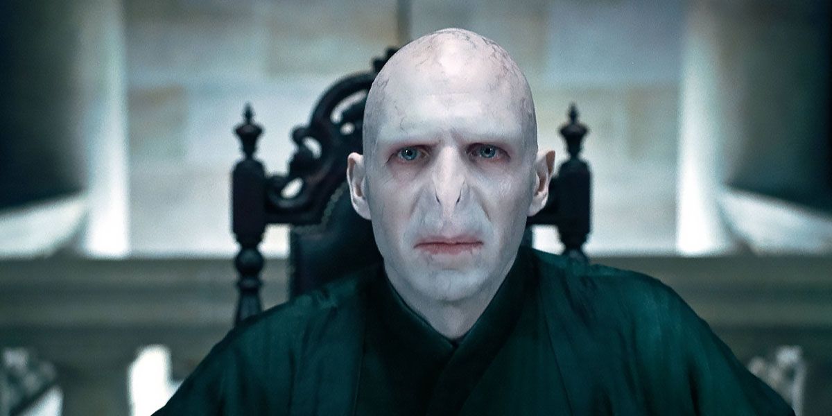 Voldemorts sits in his chair in Harry Potter and the Deathly Hallows Part 1