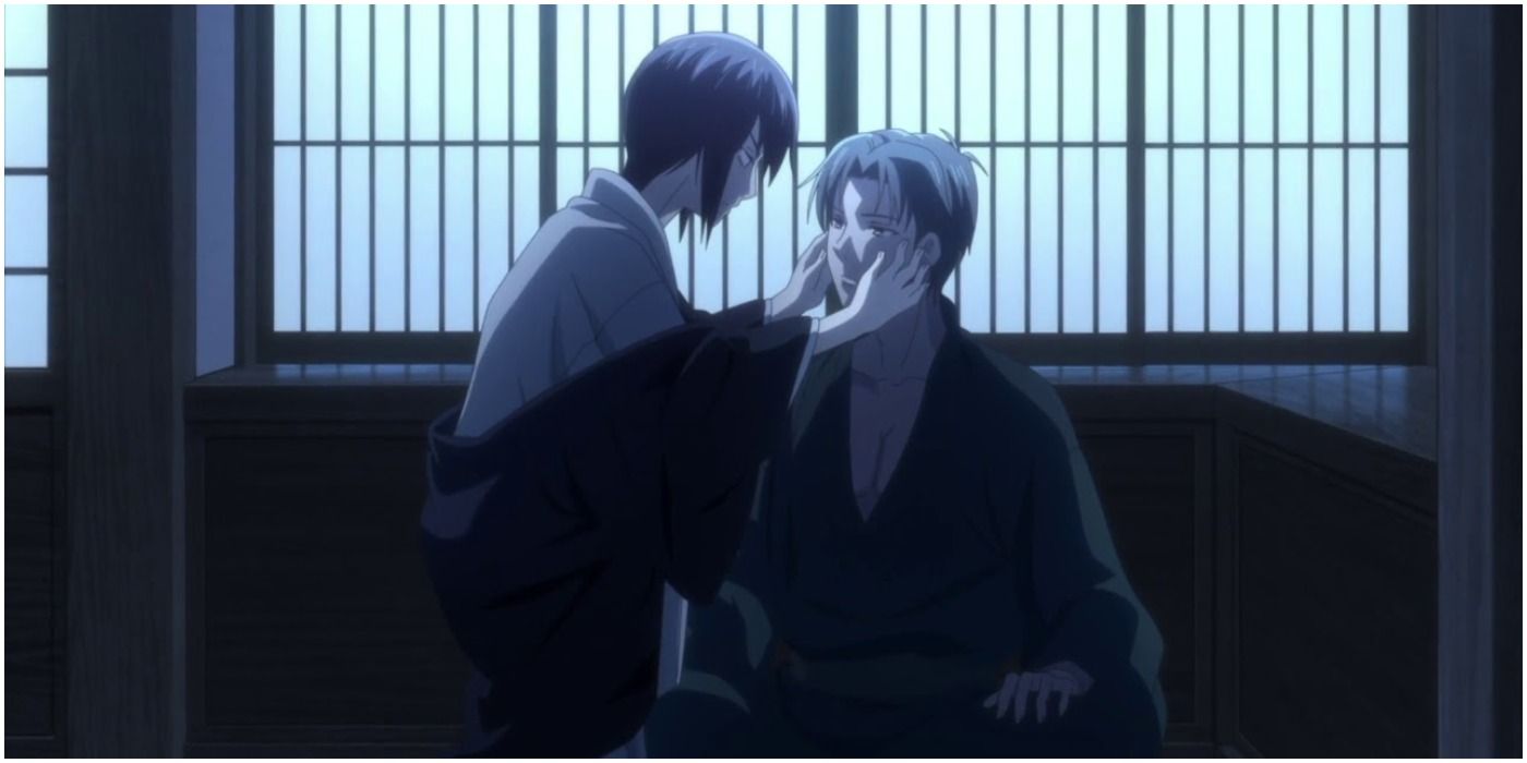 Akito takes Shigure's face in her hands (Fruits Basket).